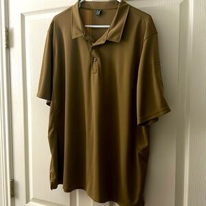 Men’s XL polo with pen holder on arm. Color tan/khaki